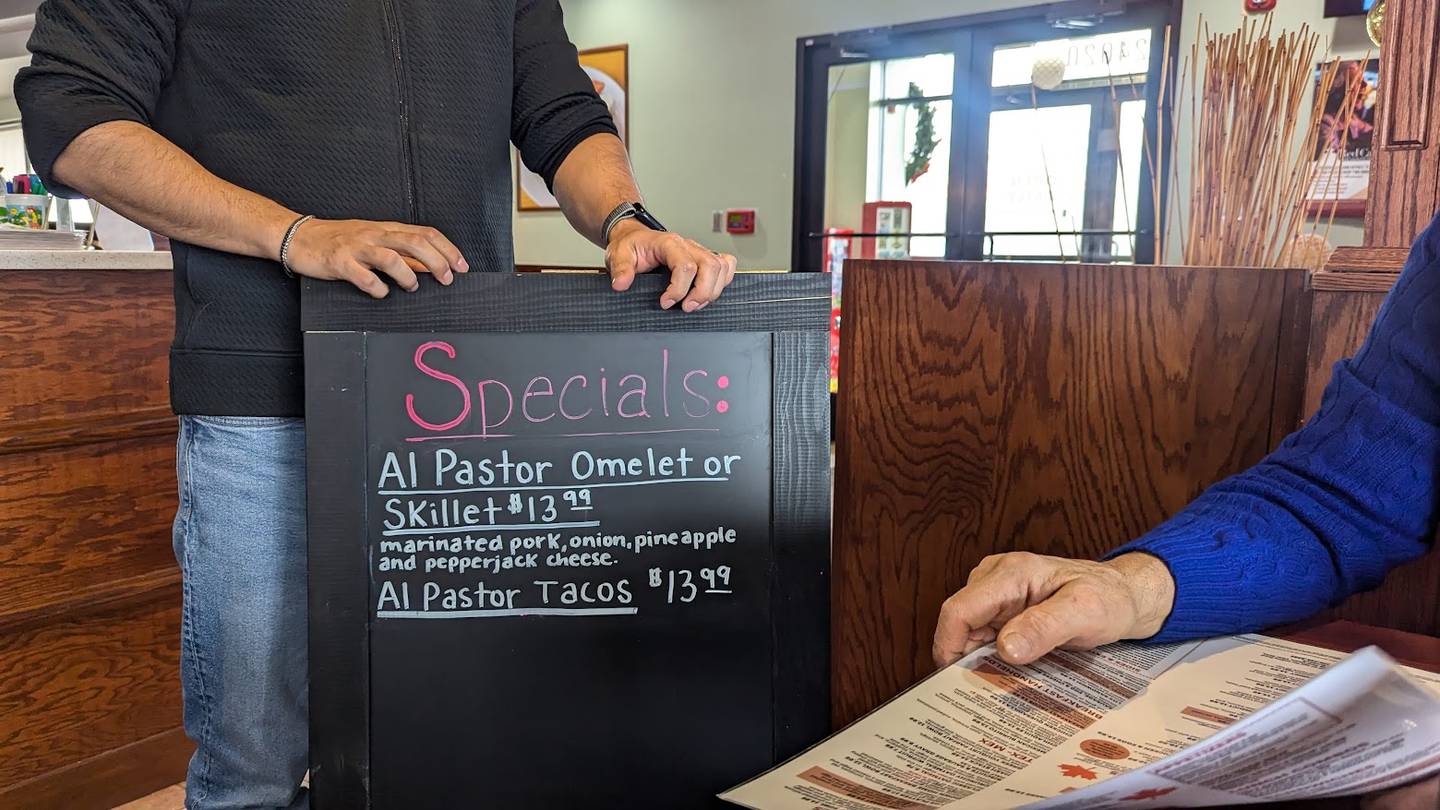 The al pastor omelets, skillet or tacos at Maple Butter Cafe in Plainfield includes marinated pork, onion, pineapple and pepper jack cheese. A sign advertising the special is seen on Monday, December 16, 2024, at Maple Butter Cafe in Plainfield.