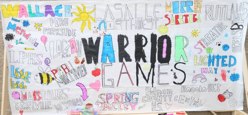 A view of the Wallace Warrior Games banner signed by all of the attending schools on Friday, May 8, 2026 at Wallace Grade School. The unified event promoted inclusiveness, friendships and fun. 25 schools and over 400 kids from La Salle, Bureau and Putnam Counties participated in the event.