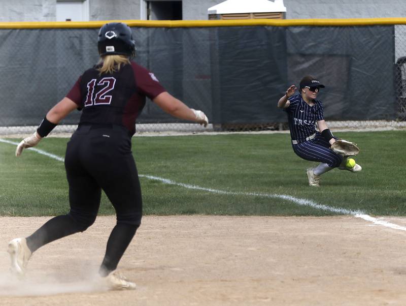 Cary-Grove’s Taylor Allen tries to make a catch in foul territory during the Class 3A Prairie Ridge Regional Championship softball game against Prairie Ridge on Friday, May 22, 2026, at Prairie Ridge High School.