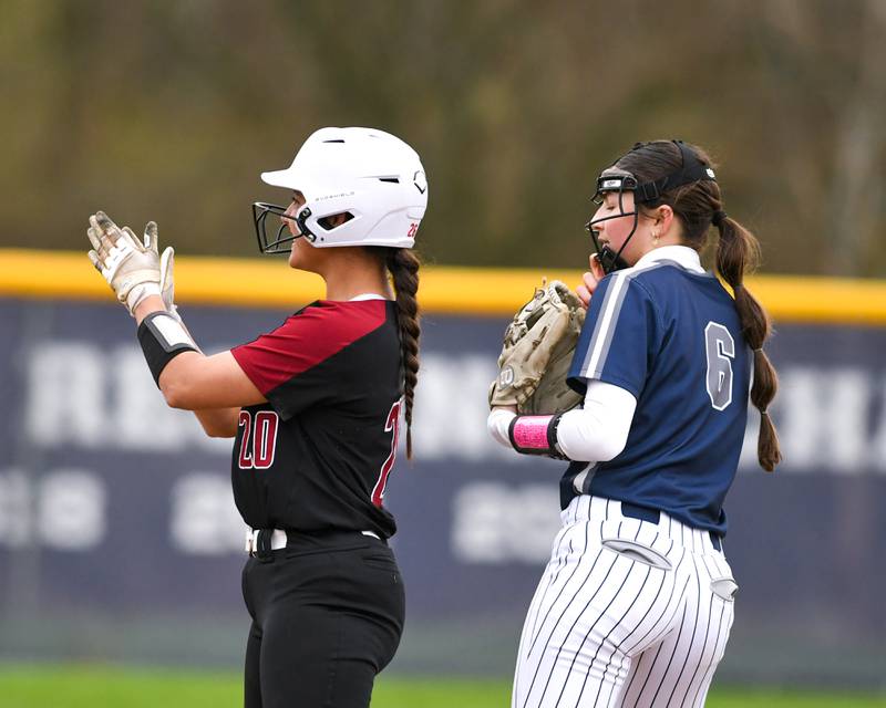 Plainfield North’s Sophia Feminis (20) celebrates her two base hit on Thursday April 17, 2025, while traveling to take on Oswego East High School.