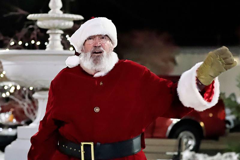 Santa was in Erie on Saturday for photos at the fire station and then after the annual Christmas Parade that evening, he closed out the festivities by lighting the town's Christmas tree.
