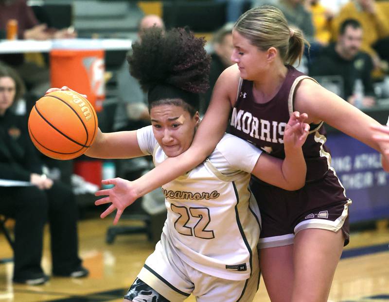 Sycamore's Jaylynn Smiley tries to get by Morris' Alyssa Jepson during their game Tuesday, Jan. 13, 2026, at Sycamore High School.