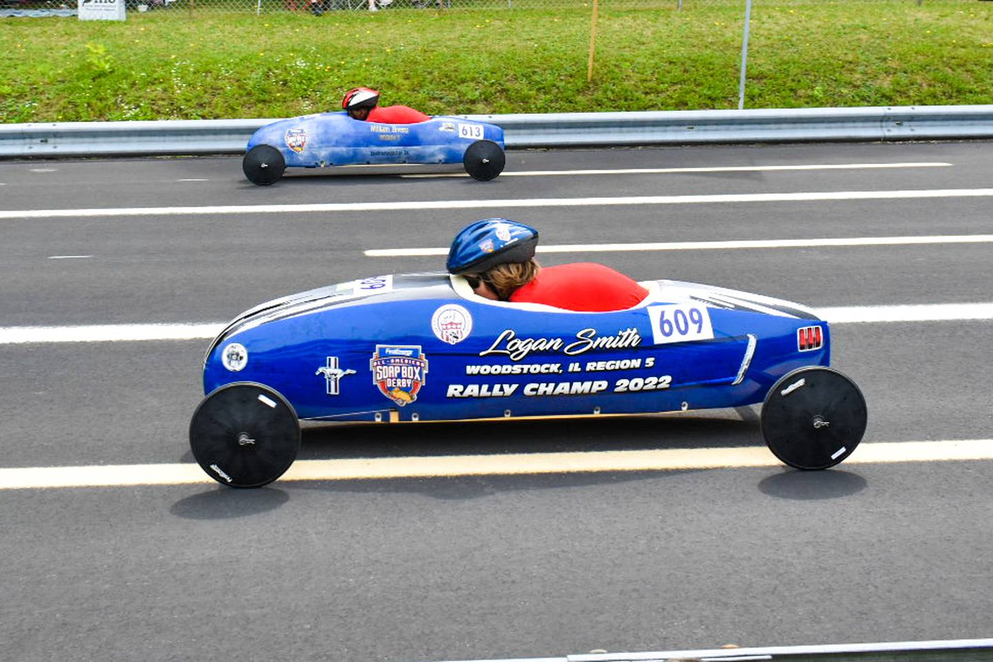 Logan Smith racing on the Naperville track.