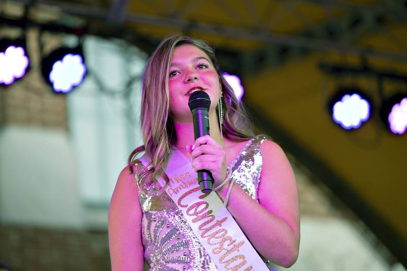 Callan Christofferson, a junior at Amboy High School, answers a question Thursday, Aug. 21, 2025, during the 2025 Miss Amboy pageant.