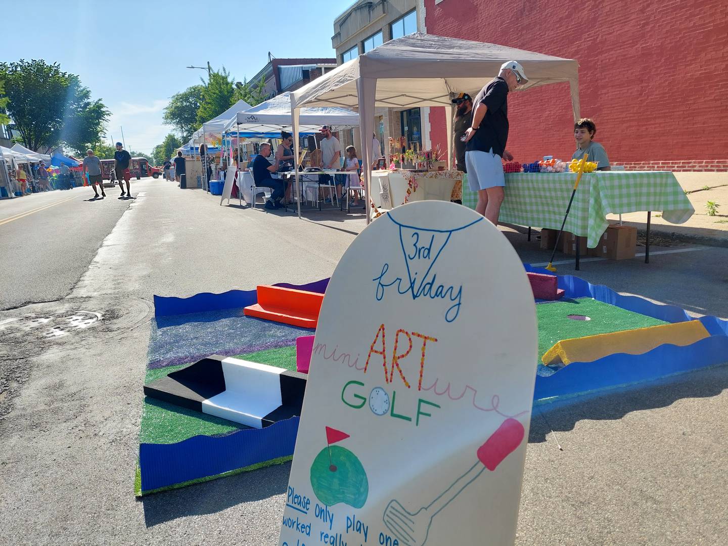 Business participated in a mini golf challenge Friday, May 17, 2024, during the Third Friday market in downtown Ottawa.