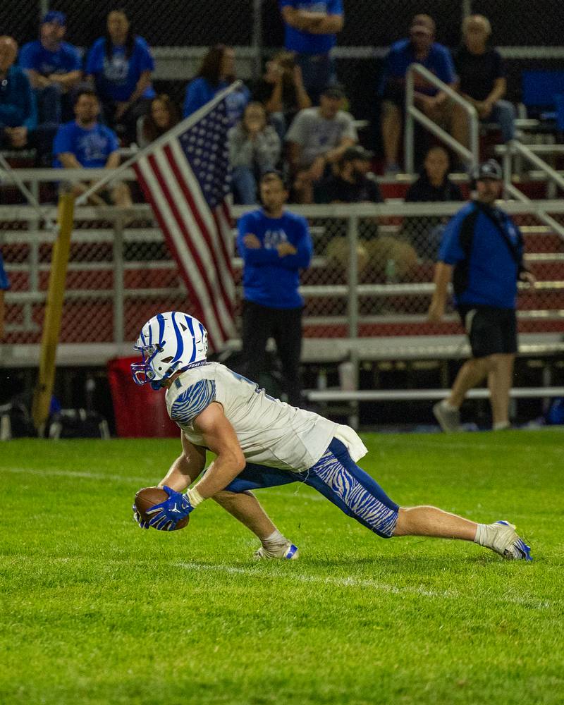 Casey Etheridge (1) of Princeton runs ball on Friday, Oct. 3, 2025 at Richard Nesti Stadium in Spring Valley.