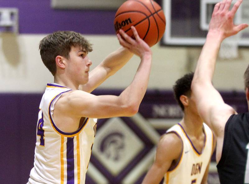 Downers Grove North’s Maxwell Haack shoots the ball during a game against Glenbard West at Downers Grove North on Friday, Jan. 13, 2023.