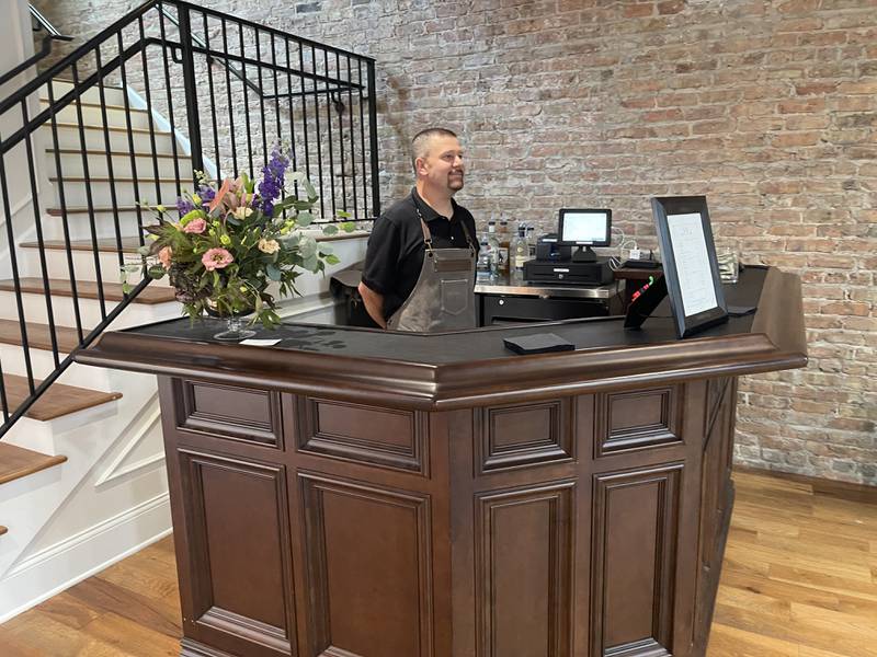 Carlos Aguerre bartends at The District in Richmond, Sept. 17, 2022. The District had its grand opening over the weekend as part of Richmond celebrating its 150th year.