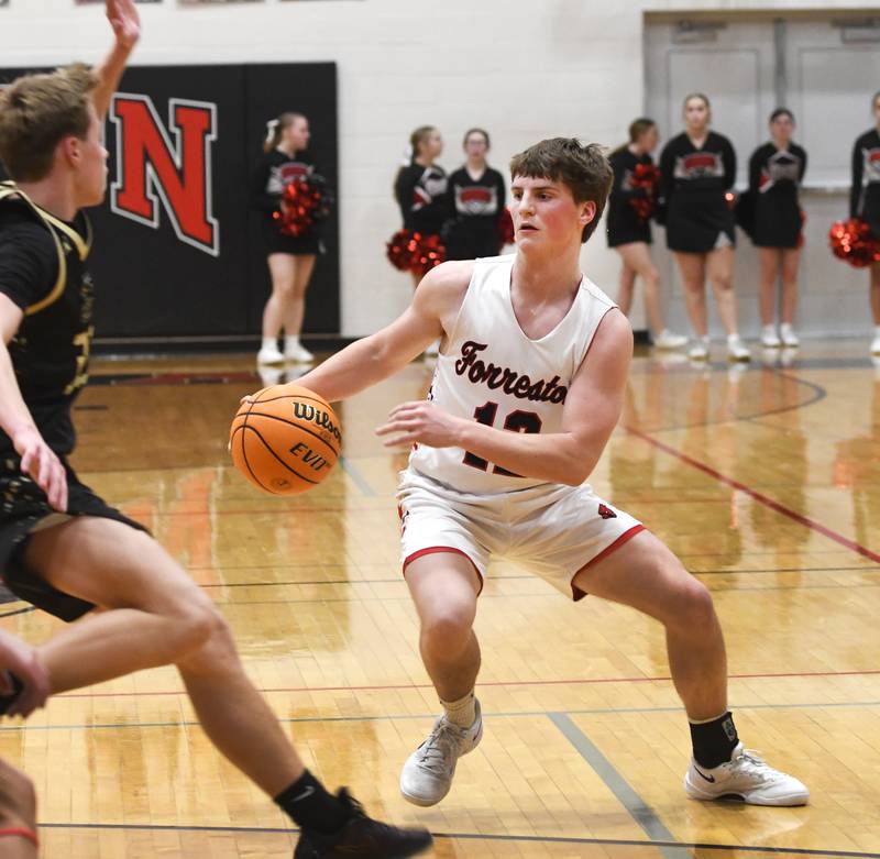 Forreston's Darin Greenfield handles the ball against Pecatonica during a game on Wednesday, Feb. 11, 2026 at Forreston High School.