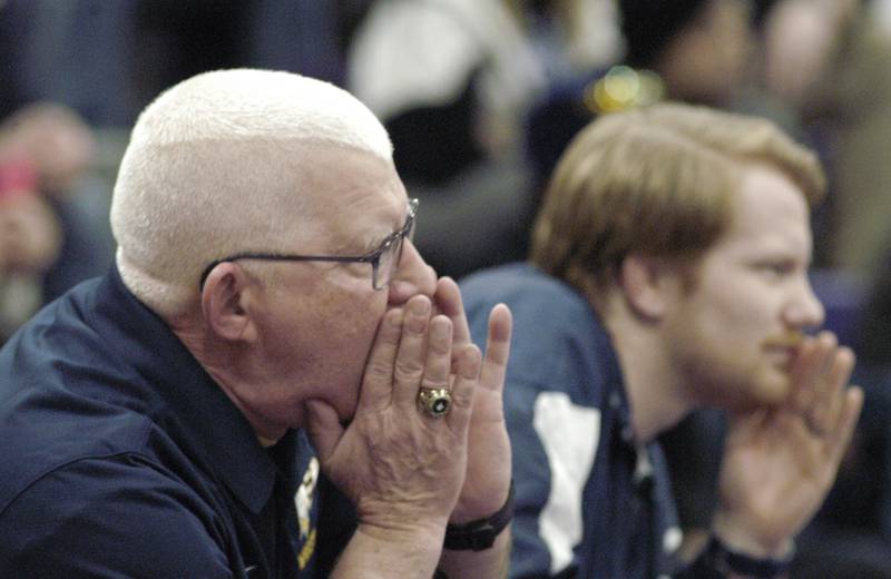 Sterling wrestling coaches Bob and Nolan Baker shout encouragement at the Class 2A Dixon Regional on Saturday, Feb. 8, 2025 at Lancaster Gym in Dixon.