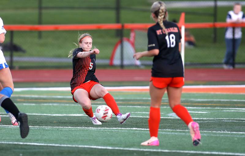 St. Charles East's Anika Dodrill kicks the ball during a Tri-Cities Soccer Night game against St. Charles North on Tuesday, April 29, 2025 in St. Charles.
