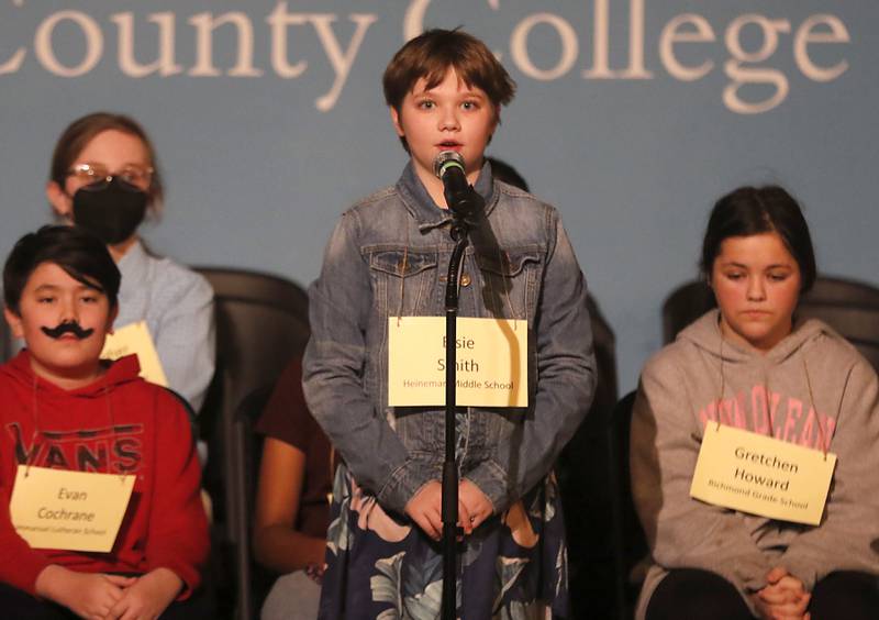 Elsie Smith of Heineman Middle School in Algonquin competes in the McHenry County Regional Office of Education 2023 Spelling Bee Wednesday, March 22, 2023, at McHenry County College's Leucht Auditorium in Crystal Lake.