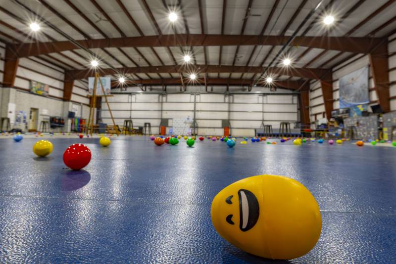 Due to rain, the Easter egg hunt was brought indoors on the hangar floor where thousands of easter eggs were separated by age groups. The event was hosted by Skydive Chicago on April 7, 2024.