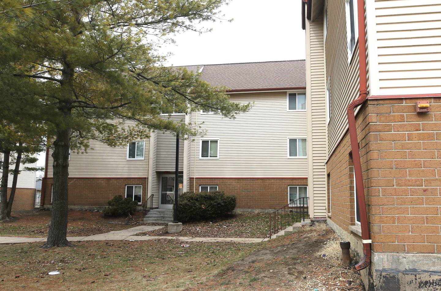 The University Village apartment building at 847 Russell Road in DeKalb where a man was fatally shot in the parking lot Sunday afternoon. Romel A. Hollingsworth Jr., 20, of the 800 block of Russell Road in DeKalb, was charged with first degree murder in the fatal shooting of 33-year-old Carl Austin, according to DeKalb County court records.