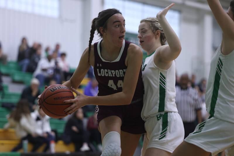 Lockport’s Alania Peetz looks to pass against Providence.