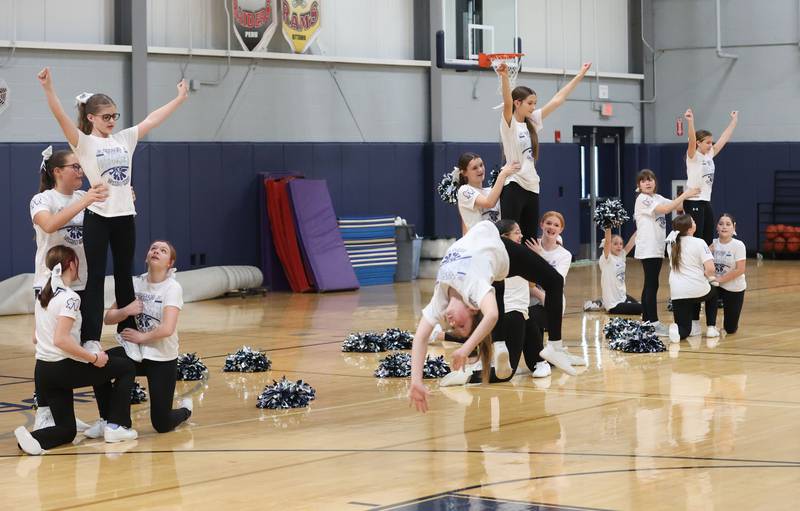 Bureau Valley Junior High cheerleaders perform during the Bureau Valley Storm seventh-grade girls basketball team prep rally on Thursday, Dec. 11, 2025 at Bureau Valley High School in Manlius. The Storm (23-1) will meet undefeated Mt. Sterling Brown County (25-0) for the IESA Class 2A state title at 7:30 p.m tonight.