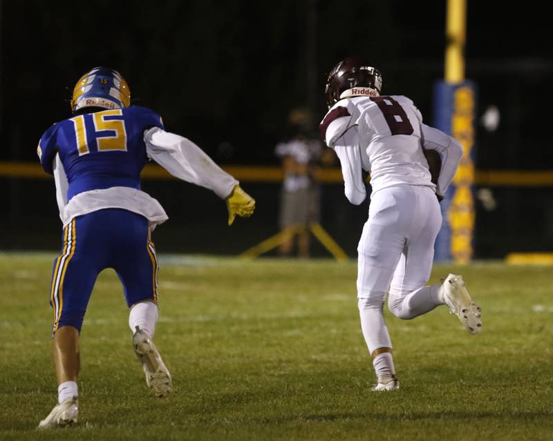 Marengo’s Parker Mandelky to the end zone after intercepting a pass intended for Johnsburg's Ashton Stern during a Kishwaukee River Conference football game on Friday, Sept. 15, 2023, at Johnsburg High School.