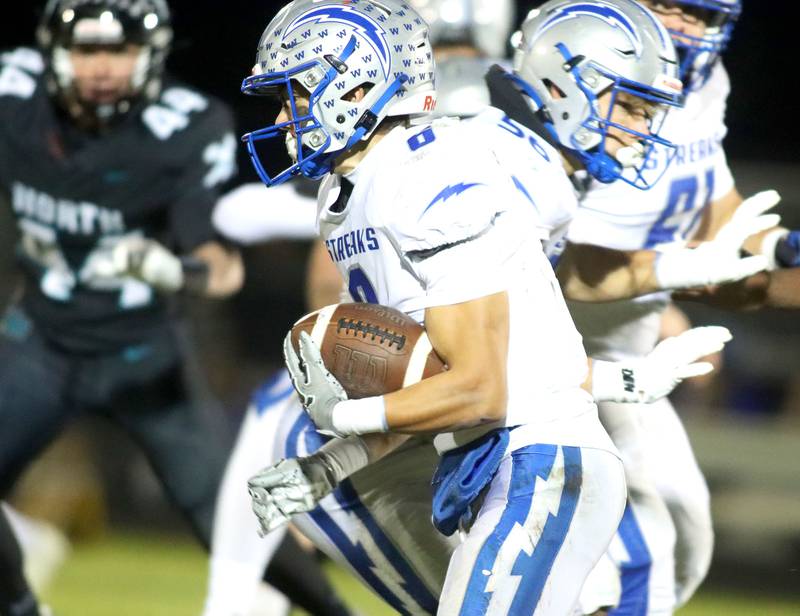 Woodstock’s Matthew Cress looks for yards after making a reception in varsity football at Woodstock North High School on Friday, October 24, 2025.