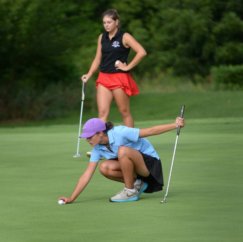 Oregon's Sarah Eckardt lines up a putt during a Monday, Aug. 18, 2025 match with Erie-Prophetstown at Silver Ridge Golf Course north of Oregon.