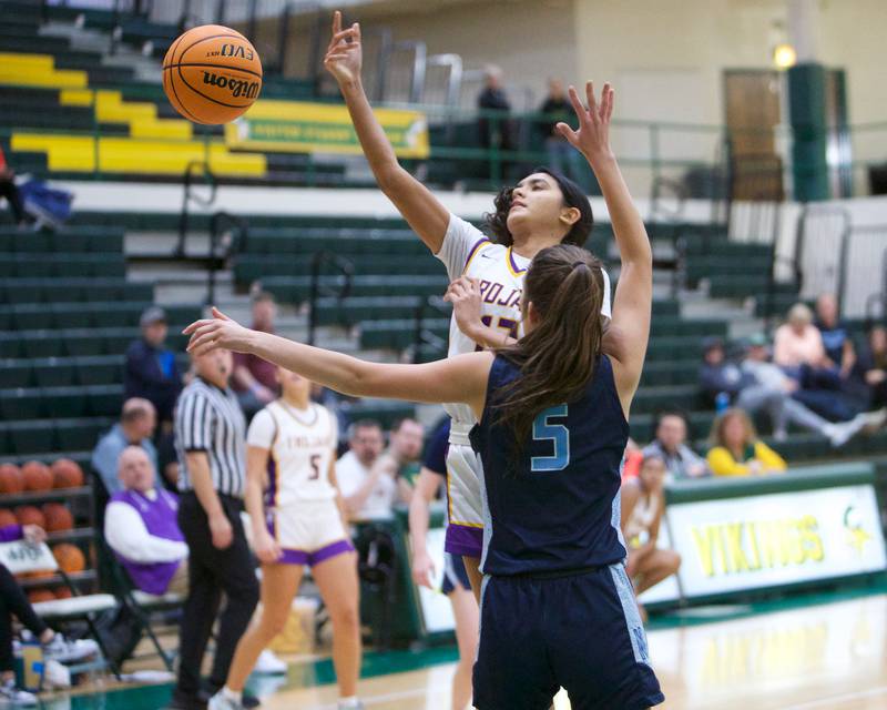 Downers Grove North's Urja Shah puts up the shot against Nazareth's Sophia Towne during the Dave Yates Chicagoland Showcase on Saturday, Dec7,2024 at Fremd in Palatine.