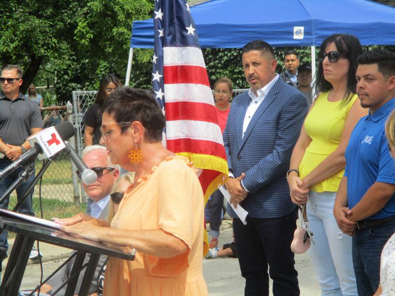 State Rep. Natalie Manley reads a House Resolution passed by state legislators to honor Staff Sgt. Jose Duenez Jr. at a ceremony dedicating Albert Avenue in Joliet in Duenez's honor. Friday, July 11, 2025.