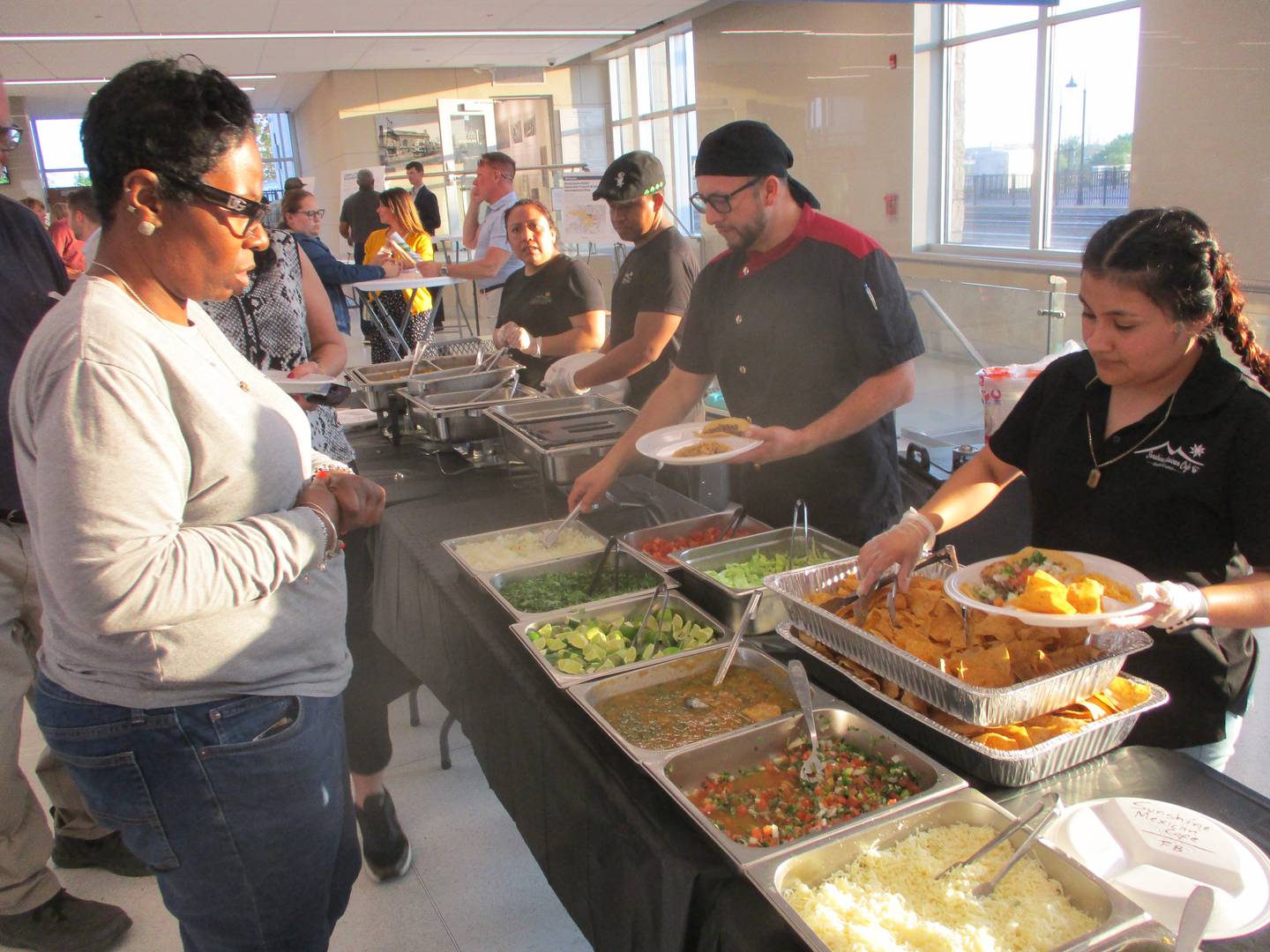 Free tacos were part of the draw that attracted more than 100 people to an open house Wednesday in which the city presented details of its Downtown Joliet Equitable Transit Oriented Development Plan. Sunshine Mexican Cafe provided the tacos. May 14, 2025