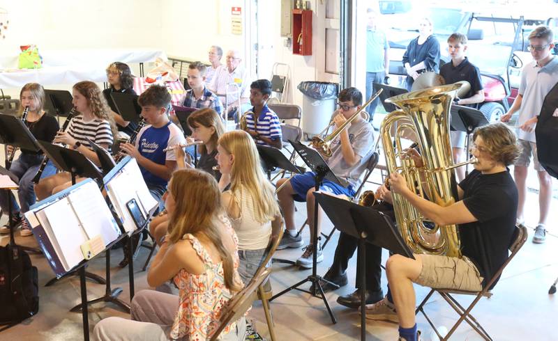 Members of the Princeton High School band play during the Quilt of Valor Tribute to Veterans ceremony on Wednesday, Aug. 20, 2025 at the Bureau County Fair in Princeton.