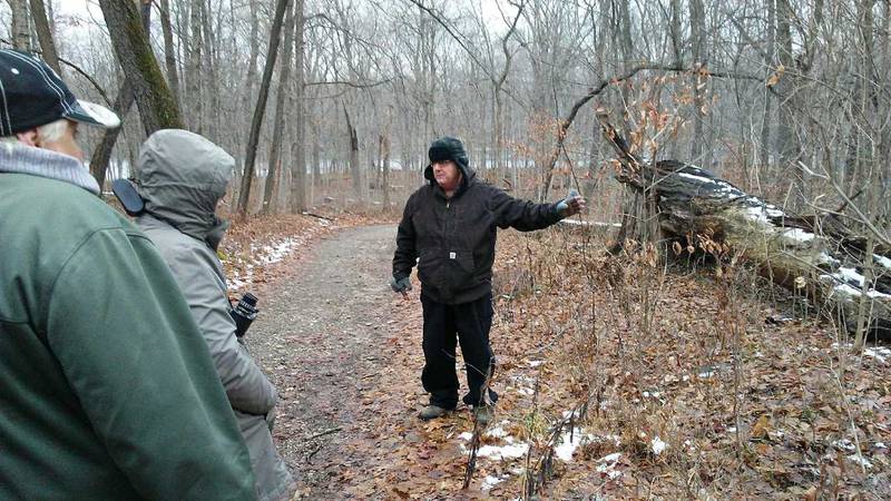 Naturalist Mark Harrington makes a point while leading a tour of Hoover Forest Preserve for the annual Kendall County New Year's Hike. (Mark Foster - mfoster@shawmedia.com)