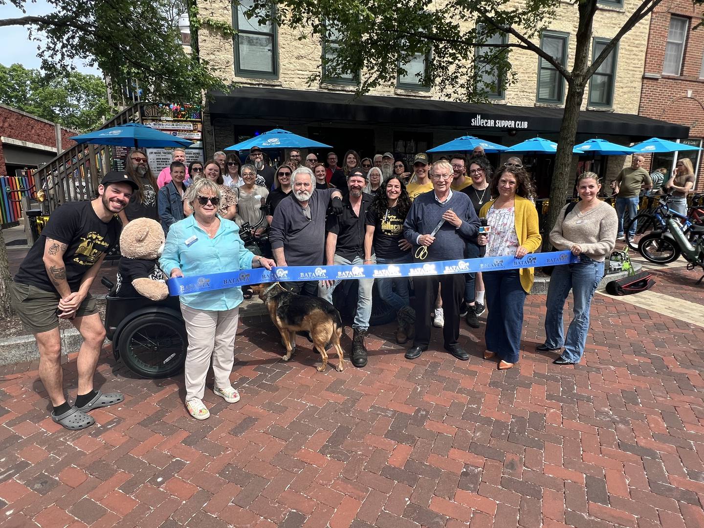The Batavia Chamber of Commerce held a ribbon-cutting ceremony Friday, May 22 for Sidecar Supper Club's 10th anniversary in downtown Batavia.
