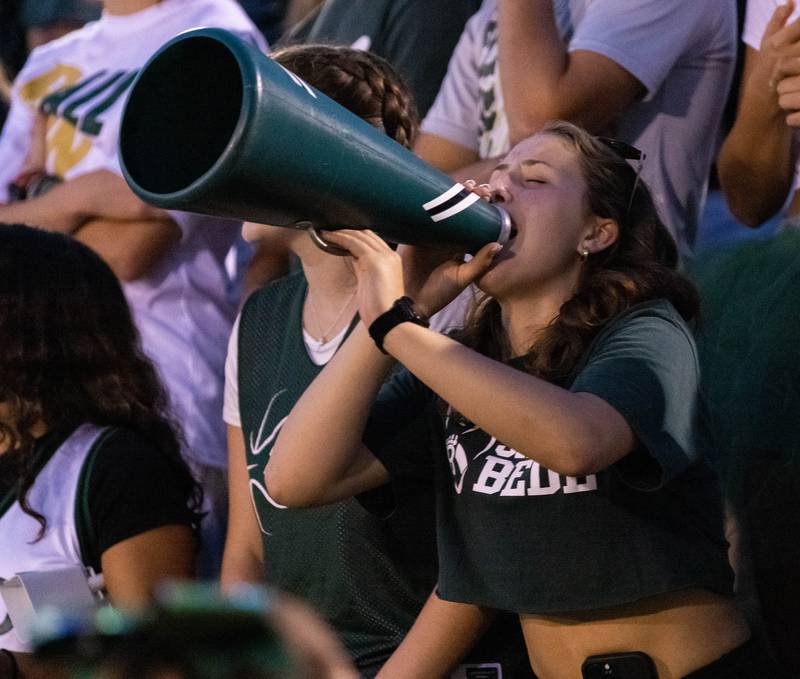 St. Bede senior Emily Robbins cheers on the Bruins late in the second quarter Friday, Sept. 2, 2022 in Peru.