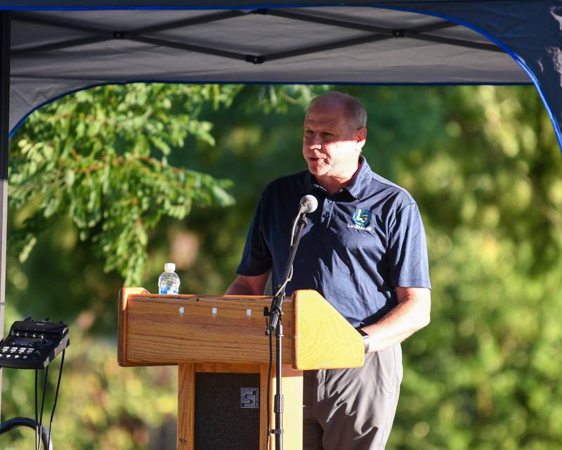 Village President of La Grange Mark Kuchler gives his opening remarks at the opening Ceremonies of The Field of Honor on Sunday Sep. 3, 2023, at Denning Park in La Grange where 500 American flags were on display to honor veterans, active military, first responders as well as frontline workers.