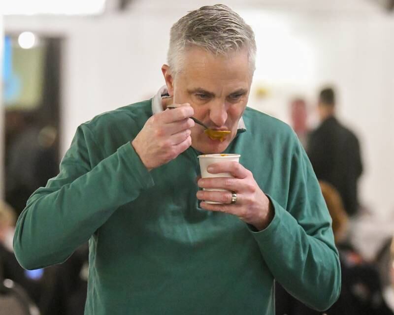 Patrick Lach of La Grange tries some soup during the Soup and Bread fundraiser event on Sunday Feb. 2, 2025, that benefits Beds Plus held at the Holiday Inn Banquet Center in Countryside.