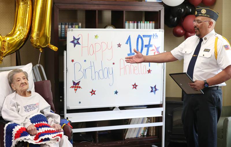 Manuel Olalde, post commander for DeKalb American Legion Post 66, introduces World War II veteran Myrtle Annetta Lusiak Thursday, May 2, 2024, during her birthday celebration at Aperion Care in DeKalb. Lusiak, who was honored Thursday with gifts and proclamations, turned 107-years-old and served in the Women’s Army Corps from Aug. 5, 1943 until her honorable discharge on Nov. 27, 1945.