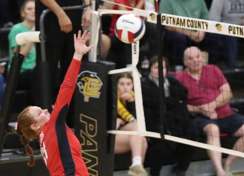 Henry-Senachwine's Brynna Anderson spikes the ball to the Seneca side of the net during the Tri-County Conference championship game on Thursday, Oct. 16, 2025 at Putnam County High School.