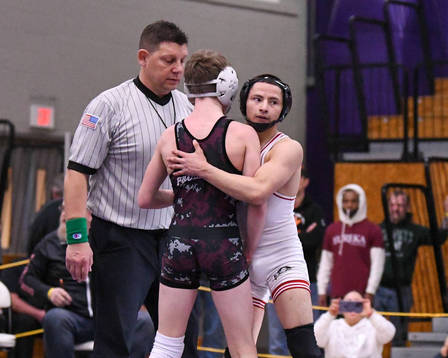 Ottawa's Ivan Munoz (right) hugs Jake Lowitzki, of Prairie Ridge, after winning the 106-pound third-place match in the Class 2A Rochelle Sectional on Saturday, Feb. 11, 2023 at Rochelle High School.