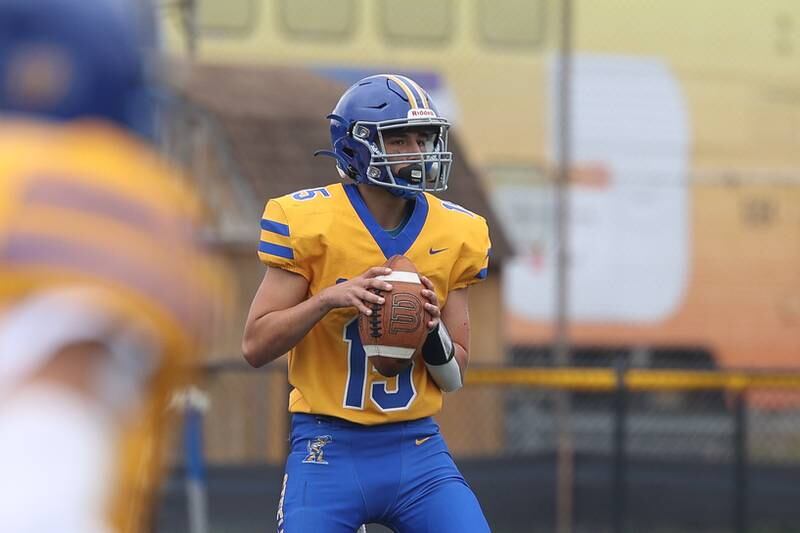 Joliet Central’s Caleb Christos looks to pass against Joliet West on Saturday, Sept. 28, 2024 in Joliet.