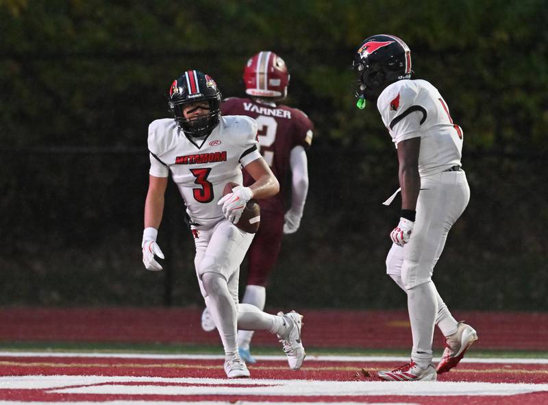 Metamora's Kylan McMillen (3) catches a pass for a touchdown during the class 4A second round playoff game against Morris on Saturday, NOV. 08, 2025, at Morris.