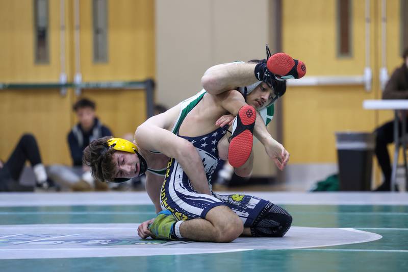Coal City's Tyson Price and Yorkville Christian's Christian Sandoval wrestle in the 120-pound third place match during the IHSA Class 1A Coal City Sectional on Saturday, Feb. 14, 2026.