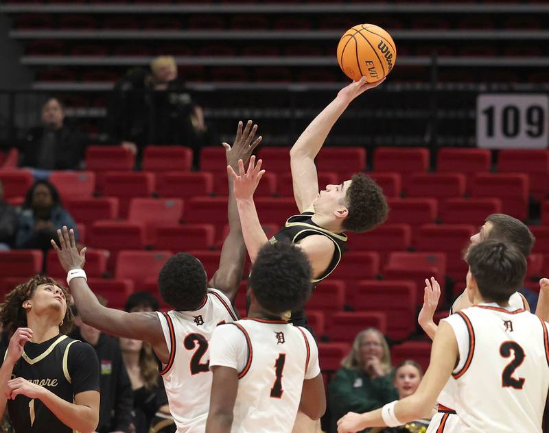 Sycamore's Marcus Johnson puts up a last second desperation shot at the buzzer that doesn’t go in giving DeKalb the win Friday, Jan. 30, 2026, during the FNBO Challenge at the Convocation Center at Northern Illinois University in DeKalb.