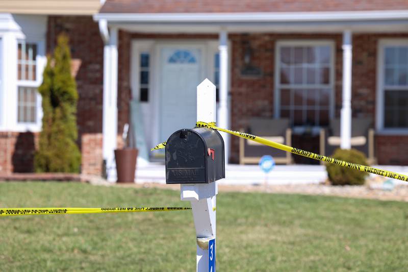 Police tape surrounds a home in the 3400 block of Norway Trail in Crete Township as the Will County Sheriff's Department investigates a triple homicide on Monday, March 23, 2026.