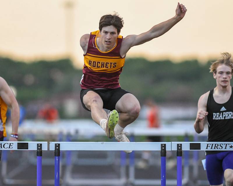 Noah Gammel of Richmon-Burton competes in the 300 meter hurdles on Tuesday May 7, 2024, during the Kishwaukee River Conference track meet held at Plano High School.