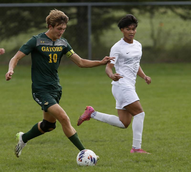 Crystal Lake South's Nolan Getzinger controls the ball while Huntley's Kyle Paler defends during a Fox Valley Conference soccer match on Thursday, Sept. 28, 2023, at Crystal Lake South High School.