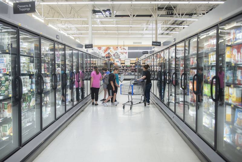 One of the groups check out the frozen food section of the store. Bi-county special education received a grant that makes the trips possible.