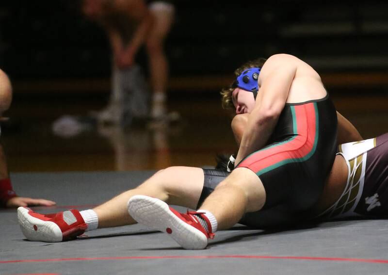 L-P's Caeden Small wrestles Morris's Michael Valverde on Thursday, Jan. 11 2024 in  Sellett Gymnasium.