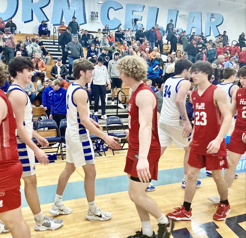 Princeton senior Teegan Davis and Hall senior Mac Resetich shake hands following Thursday's regional semifinal game at Bureau Valley. The next time they  meet will be on the Big Ten football fields for Iowa and Illinois, respectively.