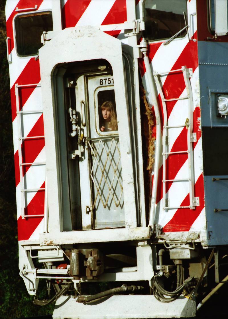 The school bus crash in Fox River Grove on October 25, 1995 killed seven students. A passenger on the train that struck the bus looks on.