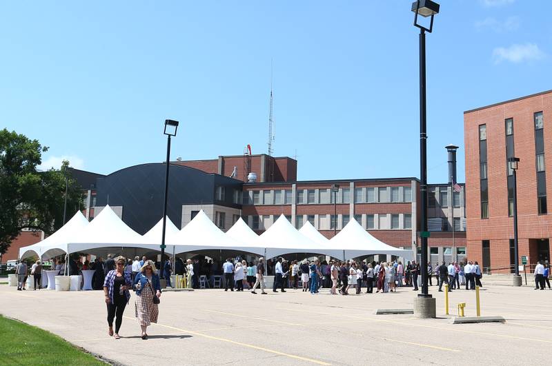 A large white tent welcomes staff, residents and OSF dignitaries to the blessing ceremony at OSF Healthcare Saint Clare Medical Center in Princeton on July 1, 2021.