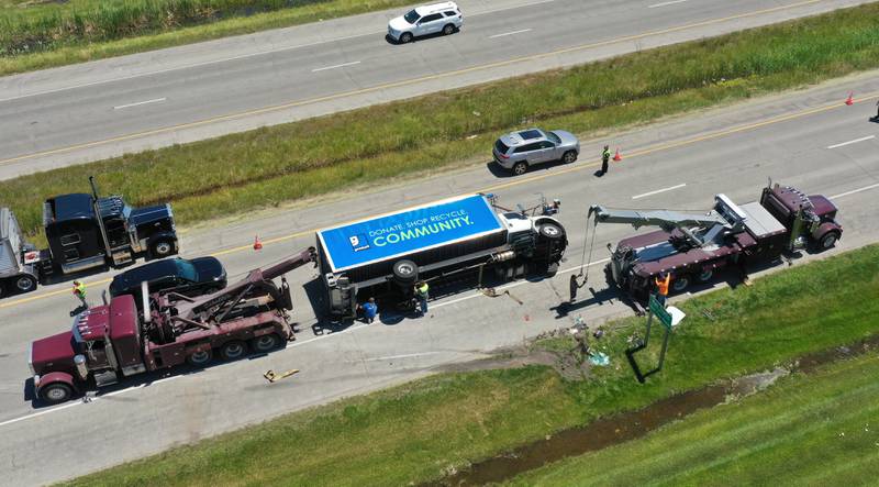 Crews work the scene of a semi truck crash on Friday, June 14, 2024 near the intersection of 38th Street and Illinois 251 in Peru. A Goodwill semi truck overturned and extrication was needed. The crash happened shortly before 11:30a.m. Illinois Route 251 was down to one lane. Peru police believe injuries were not serious.