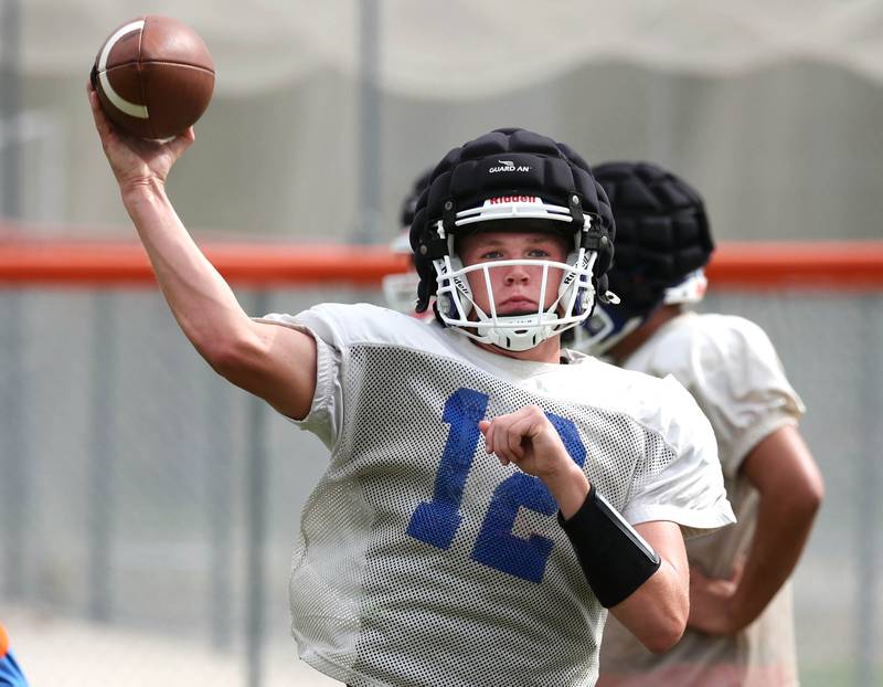 Genoa-Kingston’s Cody Cravatta throws a pass Tuesday, Aug. 19, 2025, during practice at the school.