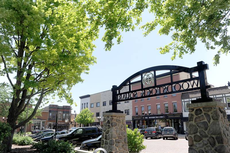 People shop Thursday, June 16, 2022, on the historic Woodstock Square. Construction on Dean Street and the new roundabout at the intersection of South Street, Madison Street and Lake Avenue has created some issues for some local businesses. A few businesses, particularly on the Square, are worried about the effect the work will have on their business this year and next year.
